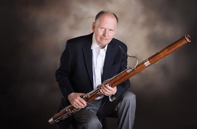 man-holding-a-bassoon
