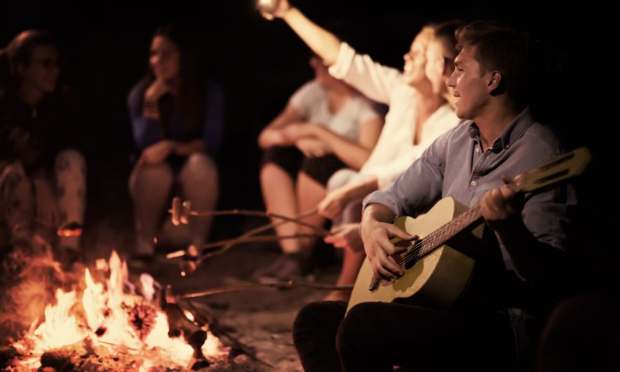 Light-Up-Your-Gatherings-With-Our-Best-25-Campfire-Songs